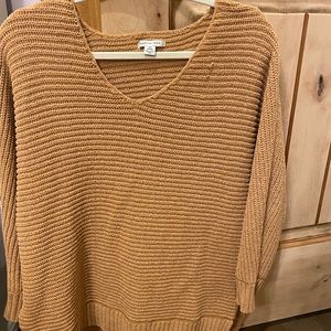 A long sleeve sweater. GREAT CONDITION